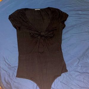 Black bodysuit with cleavage